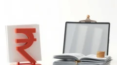 A calm banking-themed scene with a large rupee symbol beside a balance scale and a closed ledger on a desk