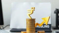 Falling arrow of coins beside a rupee symbol representing a weekly decline in Indian stock market value
